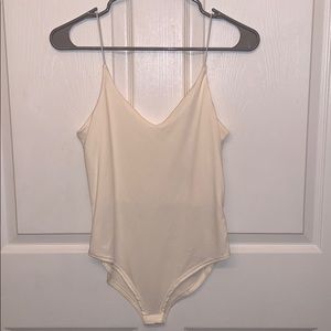 White spaghetti strap body suit